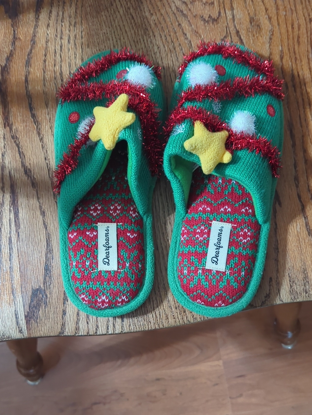 dearfoams Green Slippers with Red Trim and Yellow Star Accents